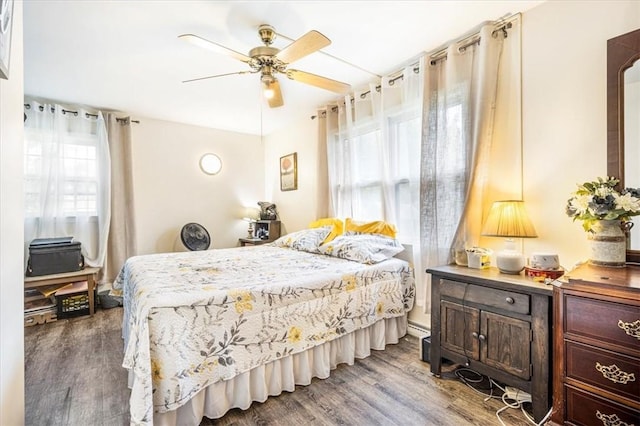 bedroom featuring ceiling fan and wood-type flooring