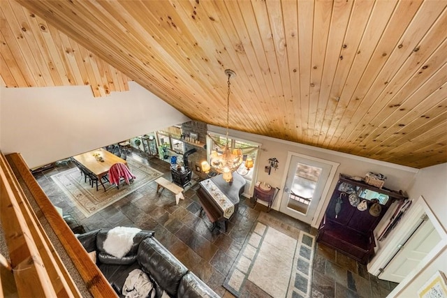 living room featuring crown molding, vaulted ceiling, a notable chandelier, and wood ceiling