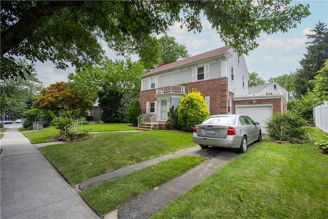 view of front facade with a garage and a front yard