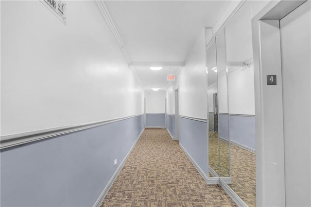 hallway featuring ornamental molding