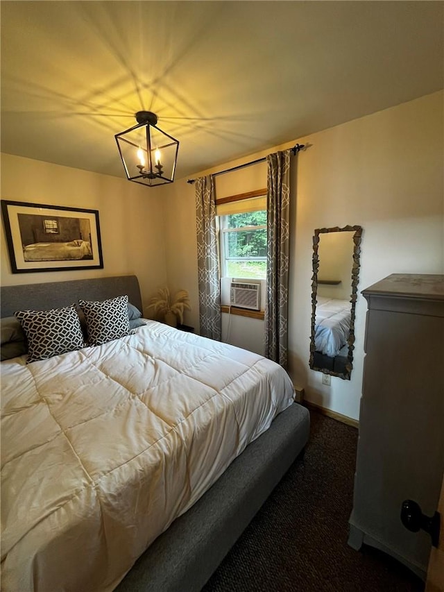 bedroom featuring cooling unit, carpet floors, and an inviting chandelier