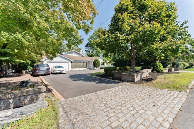 view of front of house featuring aphalt driveway