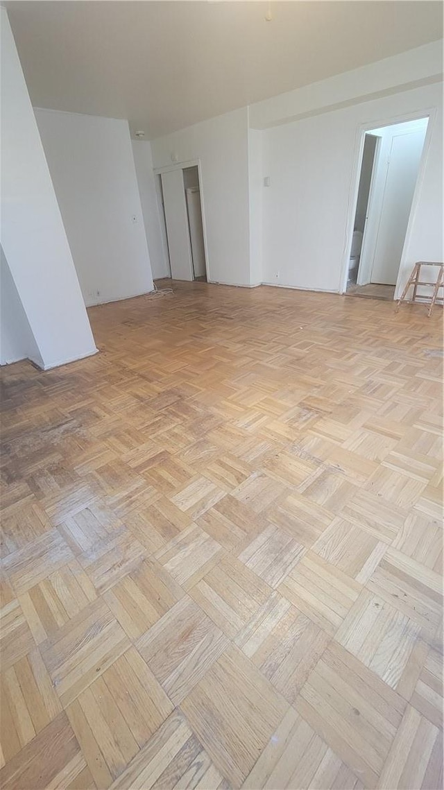 spare room featuring light parquet floors