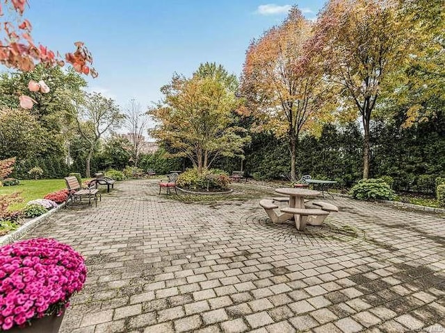 view of property's community with a patio area