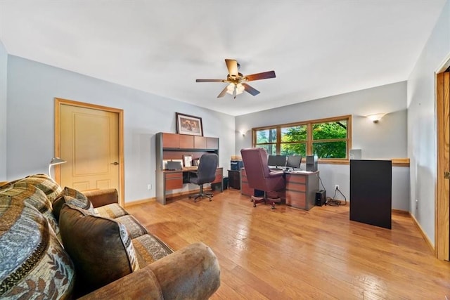 office space featuring light wood-style floors and ceiling fan