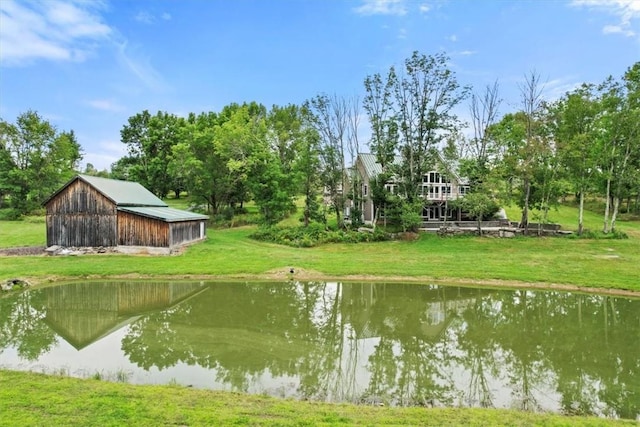 water view featuring a barn