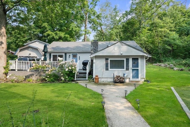 ranch-style house with a front yard