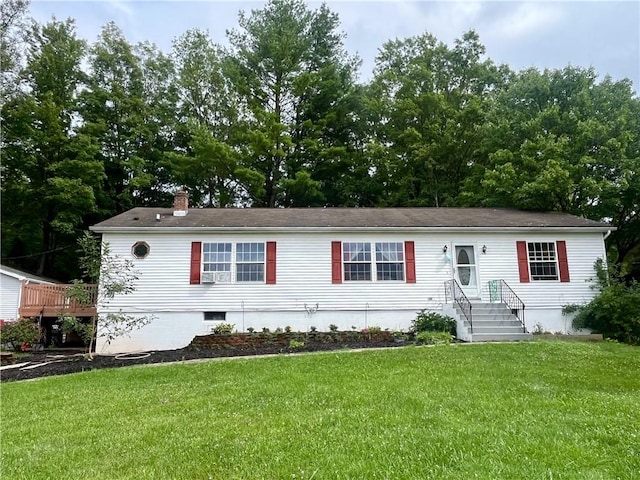 manufactured / mobile home with a front lawn