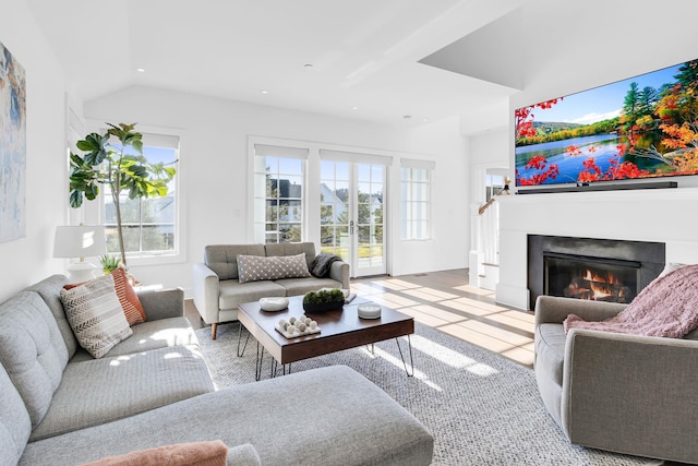 tiled living room featuring lofted ceiling