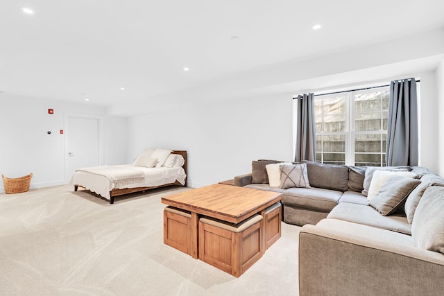 bedroom featuring light colored carpet