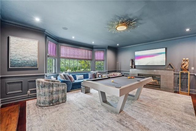 rec room with crown molding, wood-type flooring, and billiards