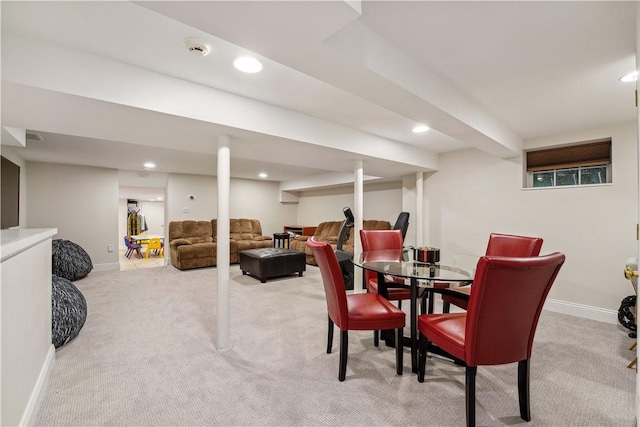 view of carpeted dining area