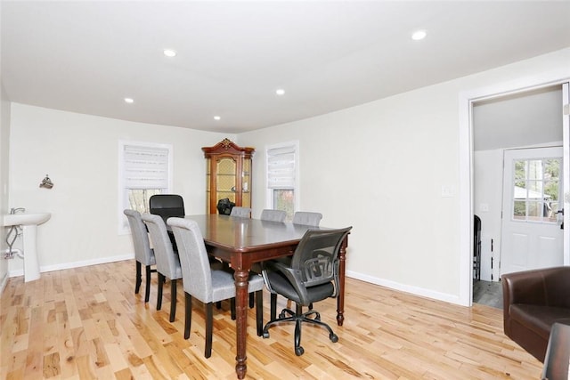 dining space featuring light hardwood / wood-style floors