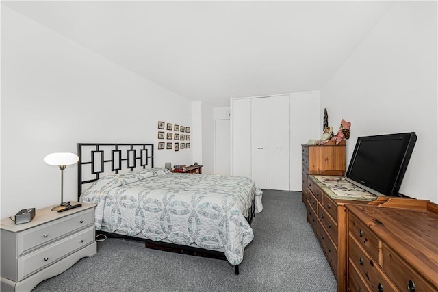 carpeted bedroom featuring a closet