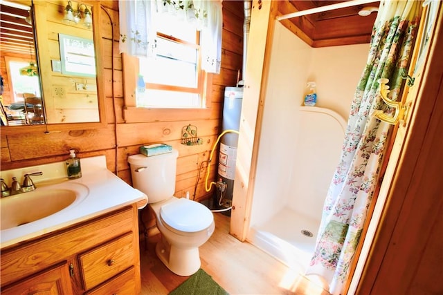 bathroom featuring curtained shower, wood walls, and plenty of natural light