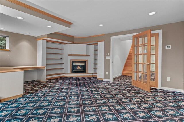 94 Overlook Dr, Andes, NY 13731 - unfurnished living room featuring dark carpet and built in features