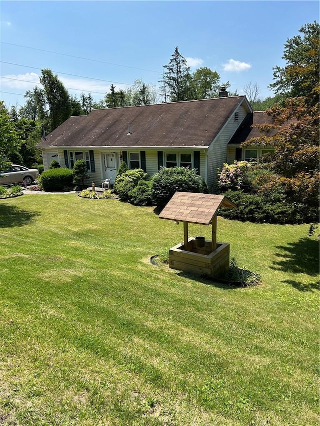 exterior space with a front yard