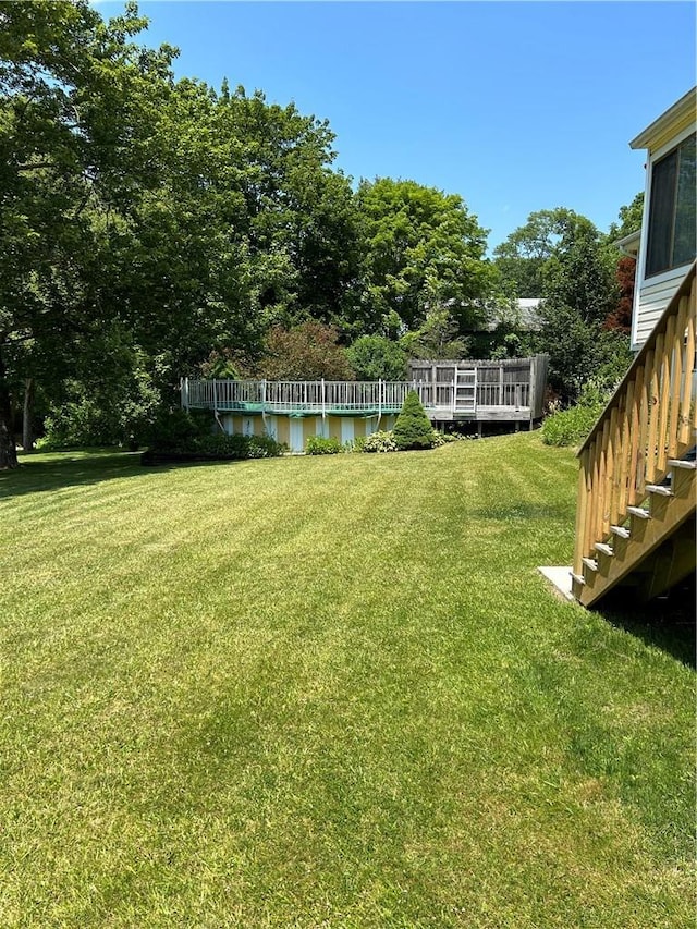 view of yard featuring a deck