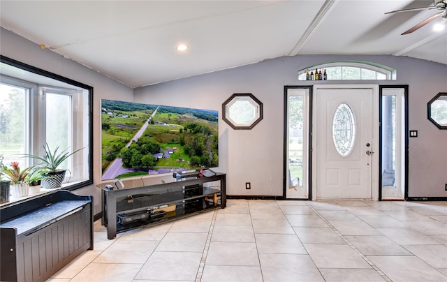 2424 State Route 17k, Montgomery, NY 12549 - entryway featuring lofted ceiling, ceiling fan, baseboards, and light tile patterned floors