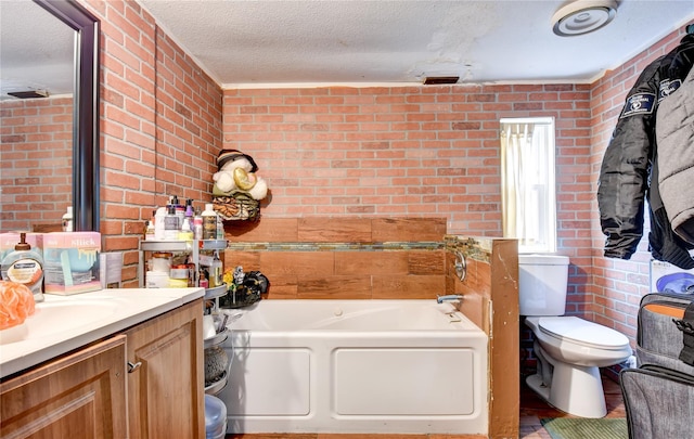 2424 State Route 17k, Montgomery, NY 12549 - full bathroom featuring vanity, brick wall, a garden tub, a textured ceiling, and toilet