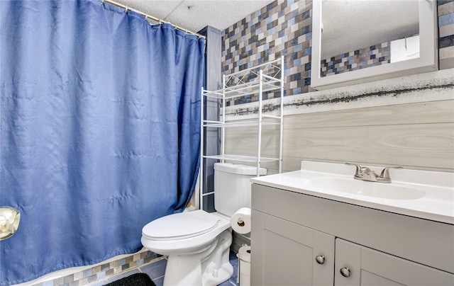 2424 State Route 17k, Montgomery, NY 12549 - bathroom featuring vanity, toilet, curtained shower, and a textured ceiling