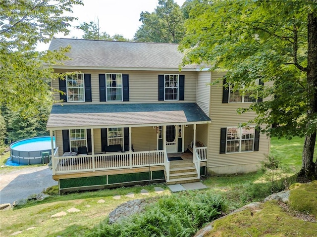 colonial inspired home with a porch