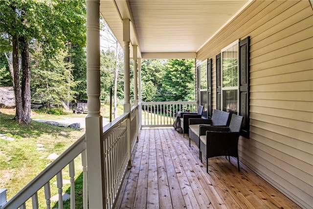 wooden deck featuring a porch