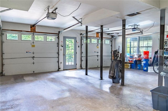 garage featuring a garage door opener