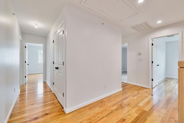 23 Northbrook Rd Unit 202, Spring Valley, NY 10977 - hallway featuring attic access, light wood-type flooring, baseboards, and recessed lighting
