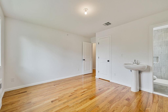 23 Northbrook Rd Unit 202, Spring Valley, NY 10977 - unfurnished bedroom with light wood-style flooring and baseboards