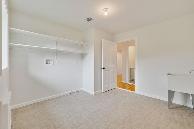 23 Northbrook Rd Unit 202, Spring Valley, NY 10977 - washroom featuring washer hookup and baseboards