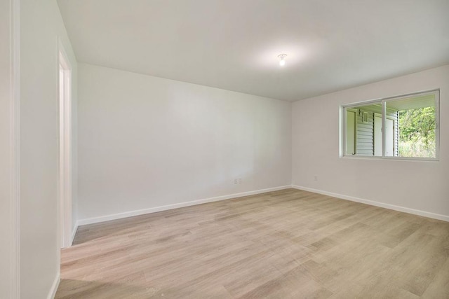 23 Northbrook Rd Unit 202, Spring Valley, NY 10977 - spare room featuring light wood-style flooring and baseboards