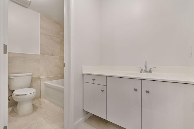 23 Northbrook Rd Unit 202, Spring Valley, NY 10977 - bathroom featuring vanity, toilet, and shower / washtub combination