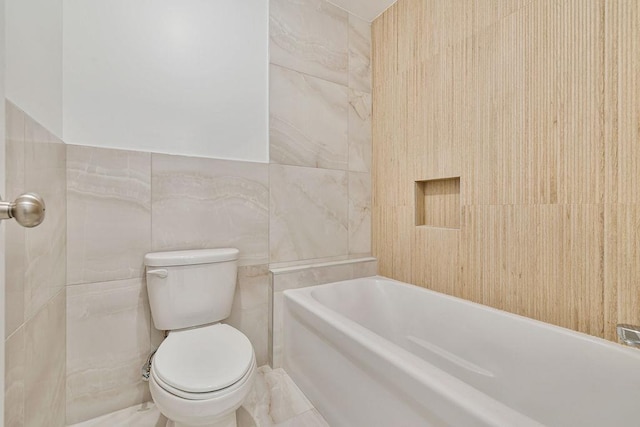 23 Northbrook Rd Unit 202, Spring Valley, NY 10977 - full bath with tile walls, a bathtub, and toilet