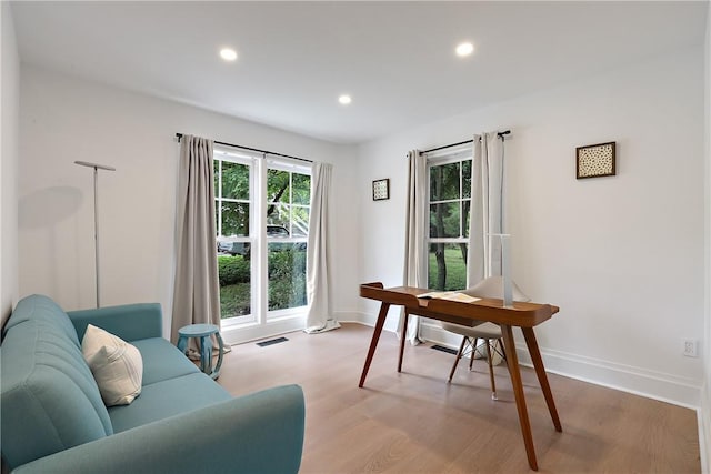 home office featuring light hardwood / wood-style floors