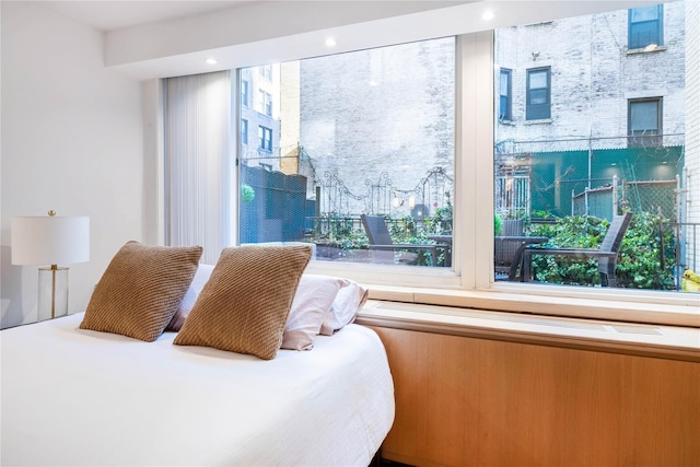 bedroom featuring multiple windows