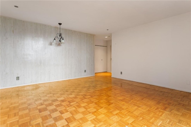 23 Water Grant St Unit 6K, Yonkers, NY 10701 - unfurnished room with baseboards, a chandelier, and wallpapered walls