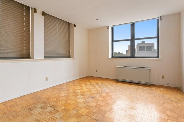 23 Water Grant St Unit 6K, Yonkers, NY 10701 - unfurnished room featuring radiator and baseboards