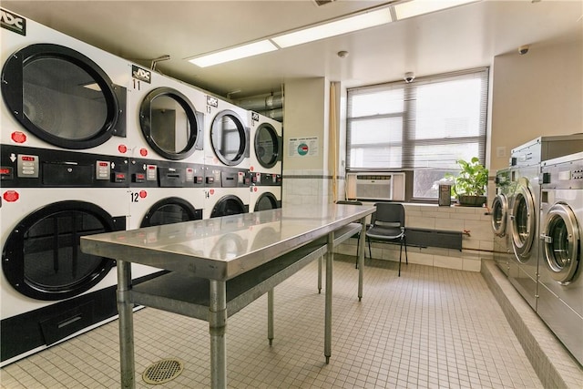 23 Water Grant St Unit 6K, Yonkers, NY 10701 - shared laundry with stacked washer / drying machine, washer and clothes dryer, tile patterned flooring, and cooling unit