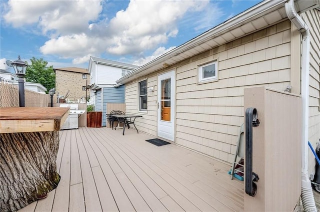 deck featuring a fire pit