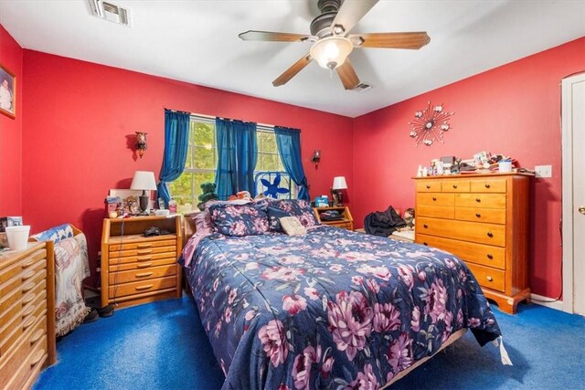 carpeted bedroom featuring ceiling fan