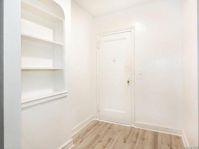 2191 Bolton St Unit 3E, Bronx, NY 10462 - doorway with light wood-style floors and baseboards