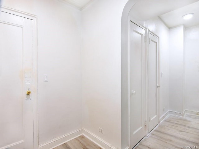 2191 Bolton St Unit 3E, Bronx, NY 10462 - hallway with light wood-style floors and arched walkways