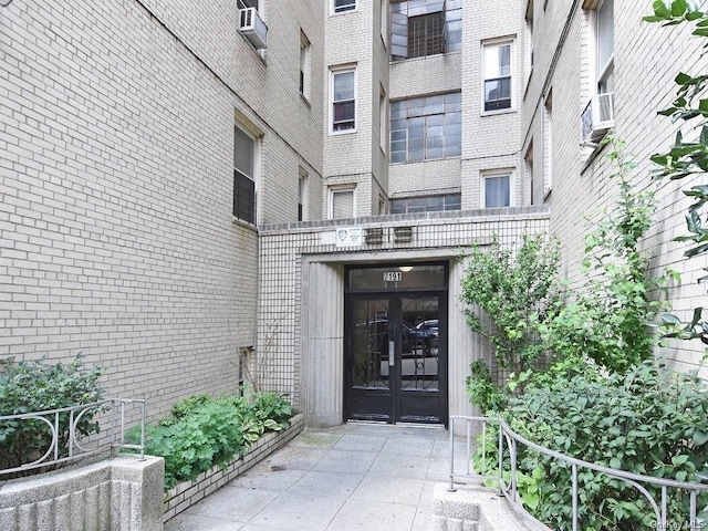 2191 Bolton St Unit 3E, Bronx, NY 10462 - property entrance with french doors and brick siding
