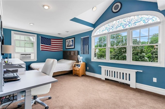 bedroom with carpet floors, vaulted ceiling, and ornamental molding