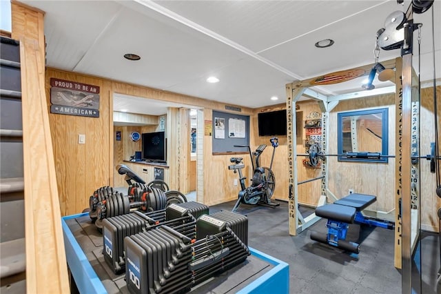 workout area with wood walls