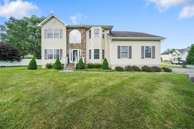 view of front of home featuring a front yard