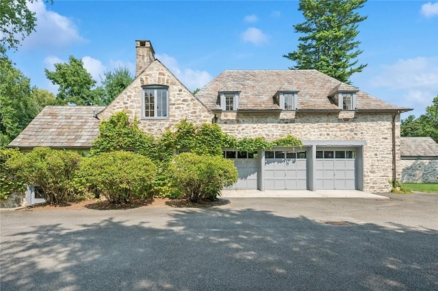 view of front of home featuring a garage