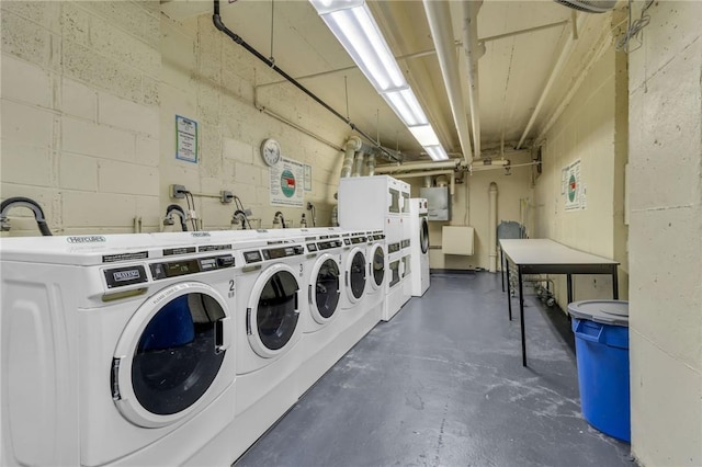 laundry area with washing machine and clothes dryer