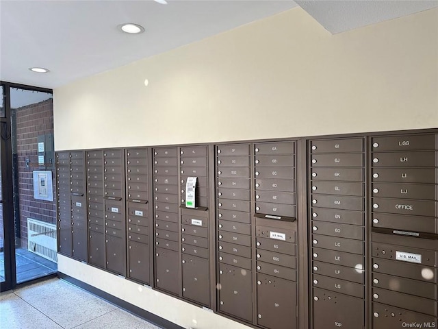 view of home's community featuring mail boxes
